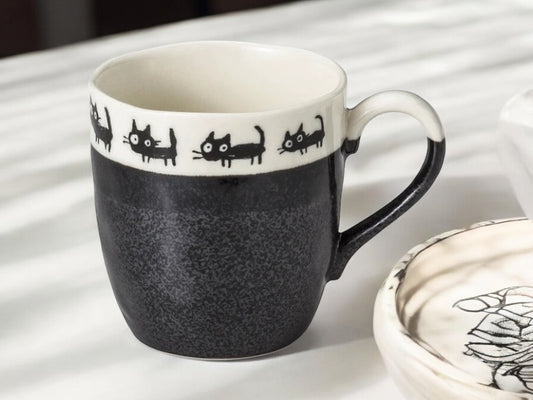 Black😺 Paws & Relax: Playful Black Cat Artisan Mug 😺